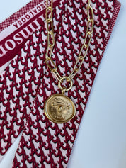 Tuscaloosa Necklace with a gold medallion engraved Tuscaloosa, Alabama and its coordinates, alternate view