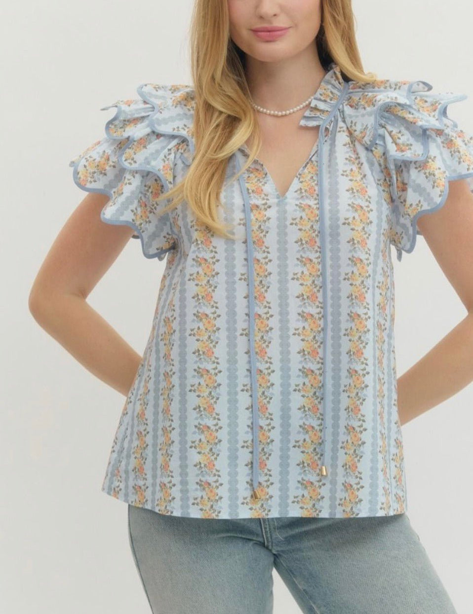 Floral Trellis Top, an airy floral trellis flared top, worn front view