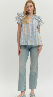 Back view of the Floral Trellis Top, an airy floral trellis flared top
