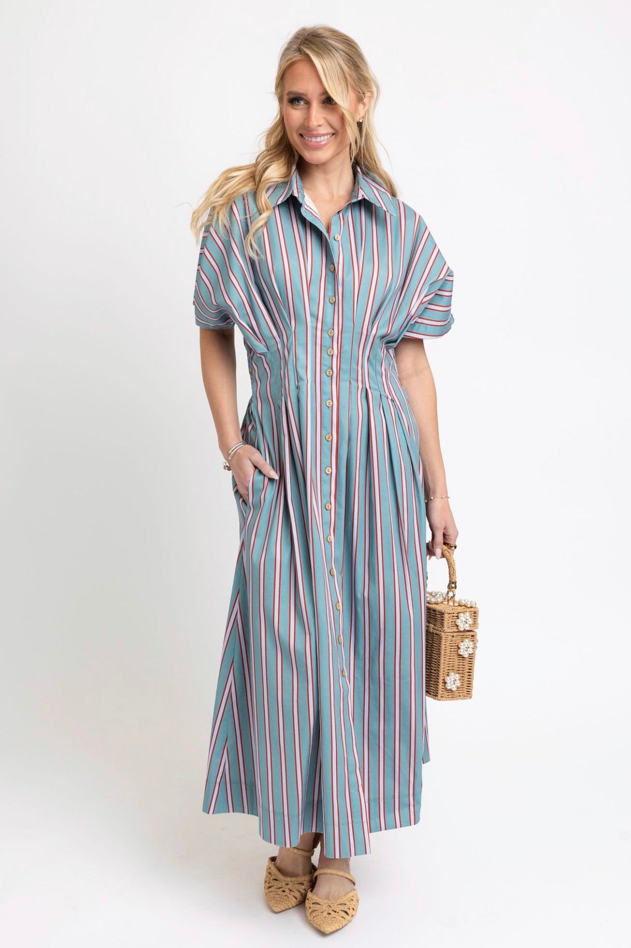 Back view of the Erin Striped Dress, an aqua midi with red and white stripes