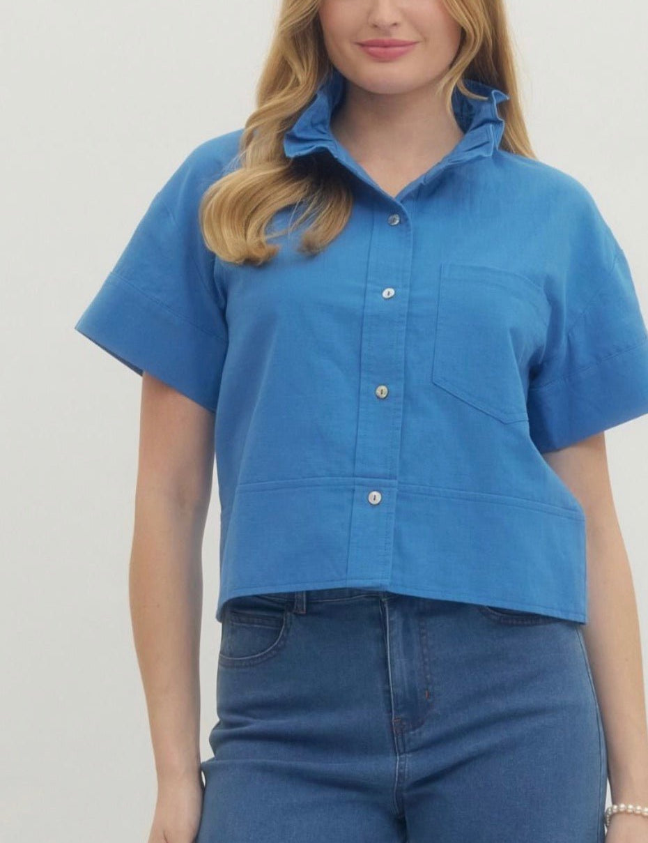 Blue Ruffle Neck Top, a blue cropped ruffle neck button-down, worn front view