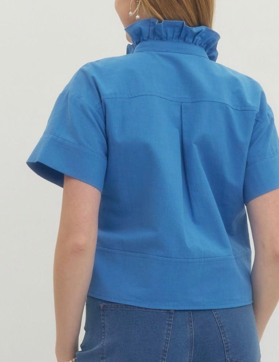 Back view of the Blue Ruffle Neck Top, a blue cropped ruffle neck button-down – Lady & Tucker
