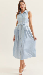 Savannah Stripe Dress, a blue and white stripe sleeveless midi shirt dress, worn front view