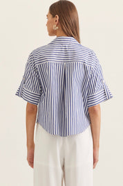 Seaside Stripe Top styled on model, a blue and white stripe menswear-inspired top – Lady & Tucker
