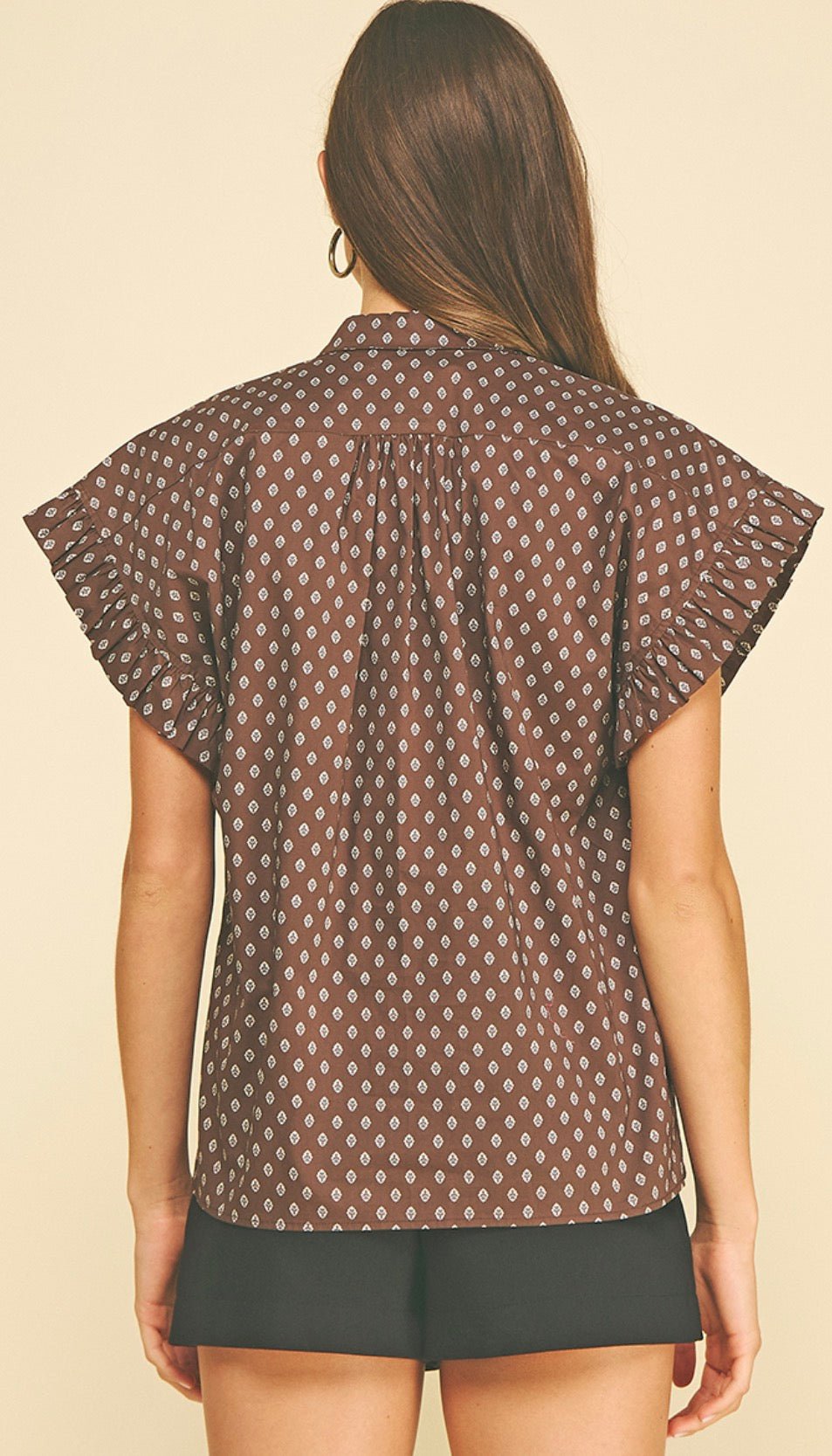 Hawthorne Top styled on model, a brown geometric print collared blouse – Lady & Tucker