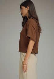 Back view of the Brown Sweater Top, a brown short sleeve ribbed knit top