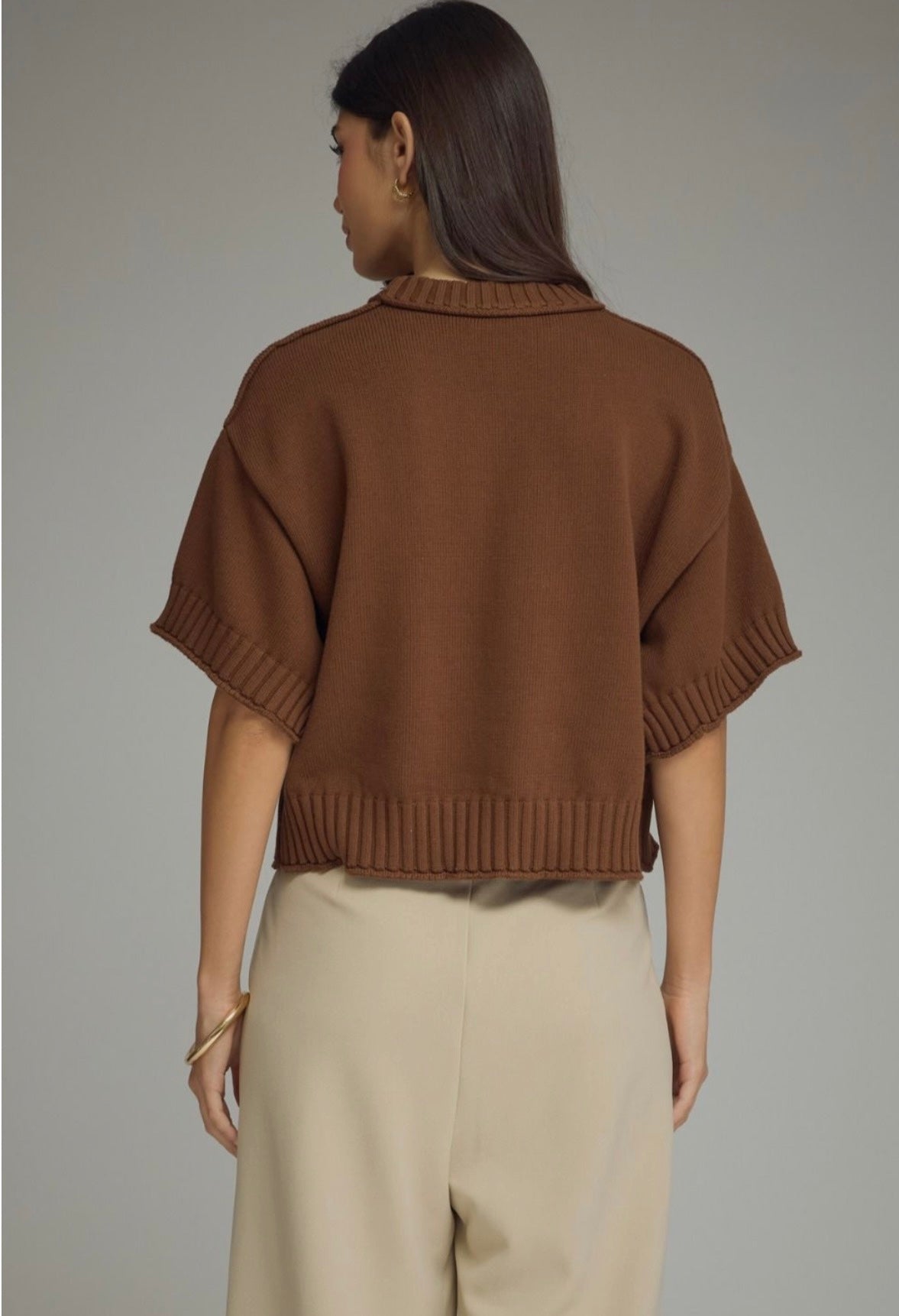 Close-up of the ribbed trim and drop shoulder on the Brown Sweater Top