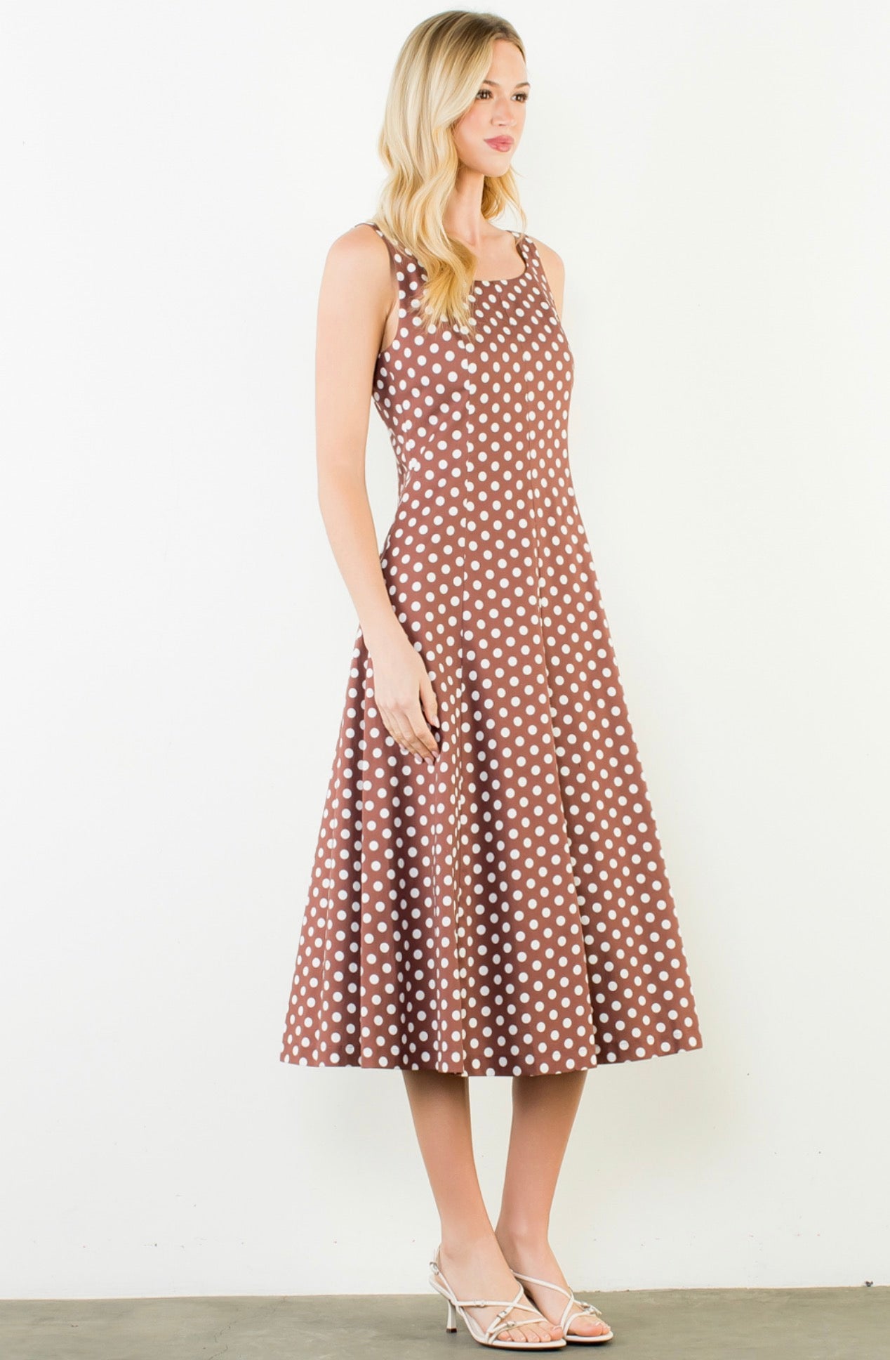 Polka Dot Brown Dress styled full length, a brown and white polka dot dress