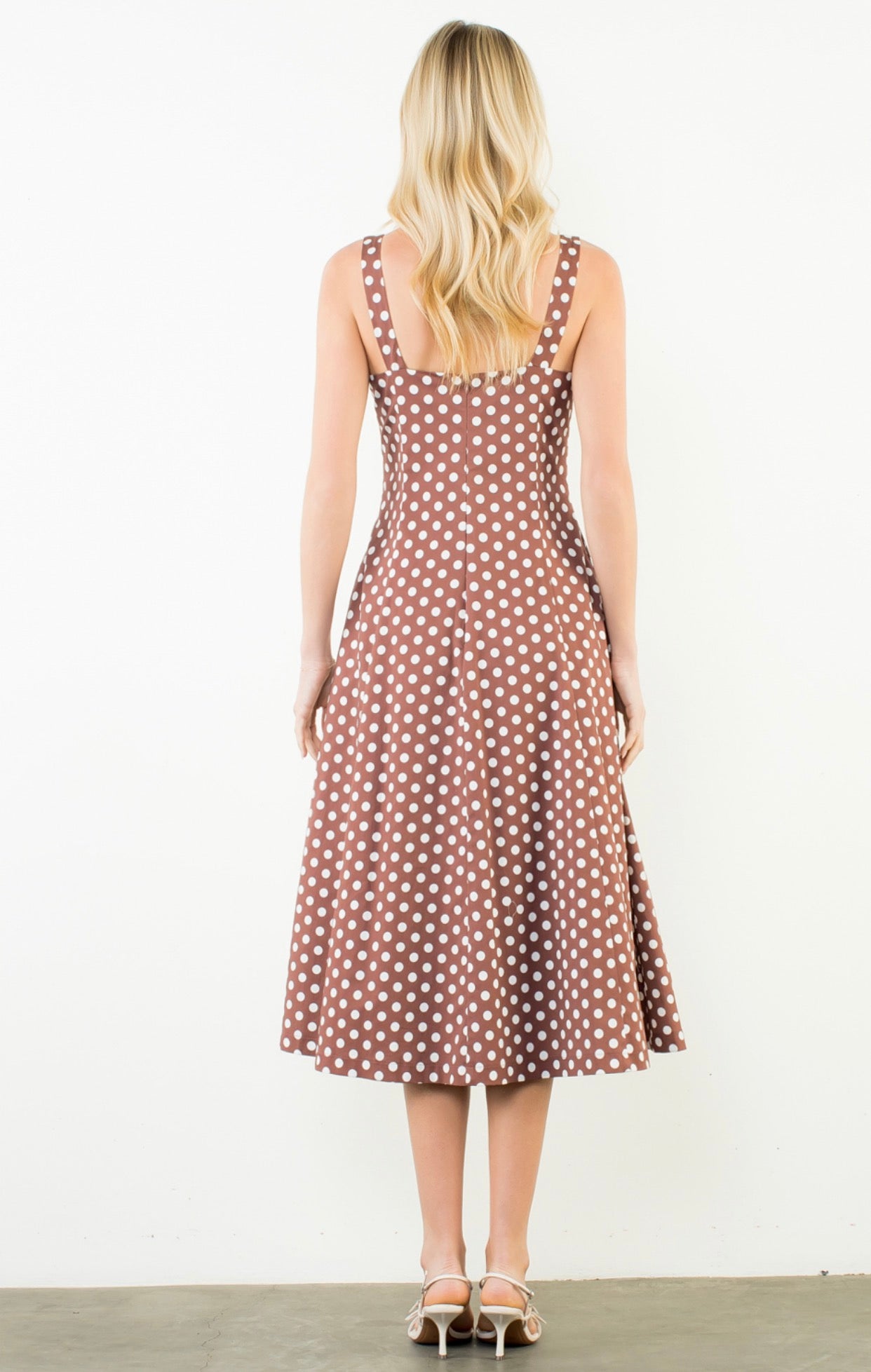 Side view of the Polka Dot Brown Dress showing the white polka dots and square neckline