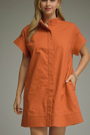 Orange Gameday Dress, a burnt orange shift dress with stand collar, worn front view
