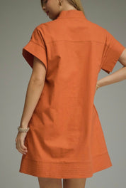 Close-up of the hidden button placket on the Orange Gameday Dress