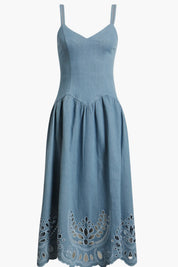 Back view of the Eye Love Dress, a chambray blue fit-and-flare midi