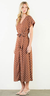 Back view of the Short Sleeve Polka Dot Dress, a cinnamon brown polka dot short sleeve midi