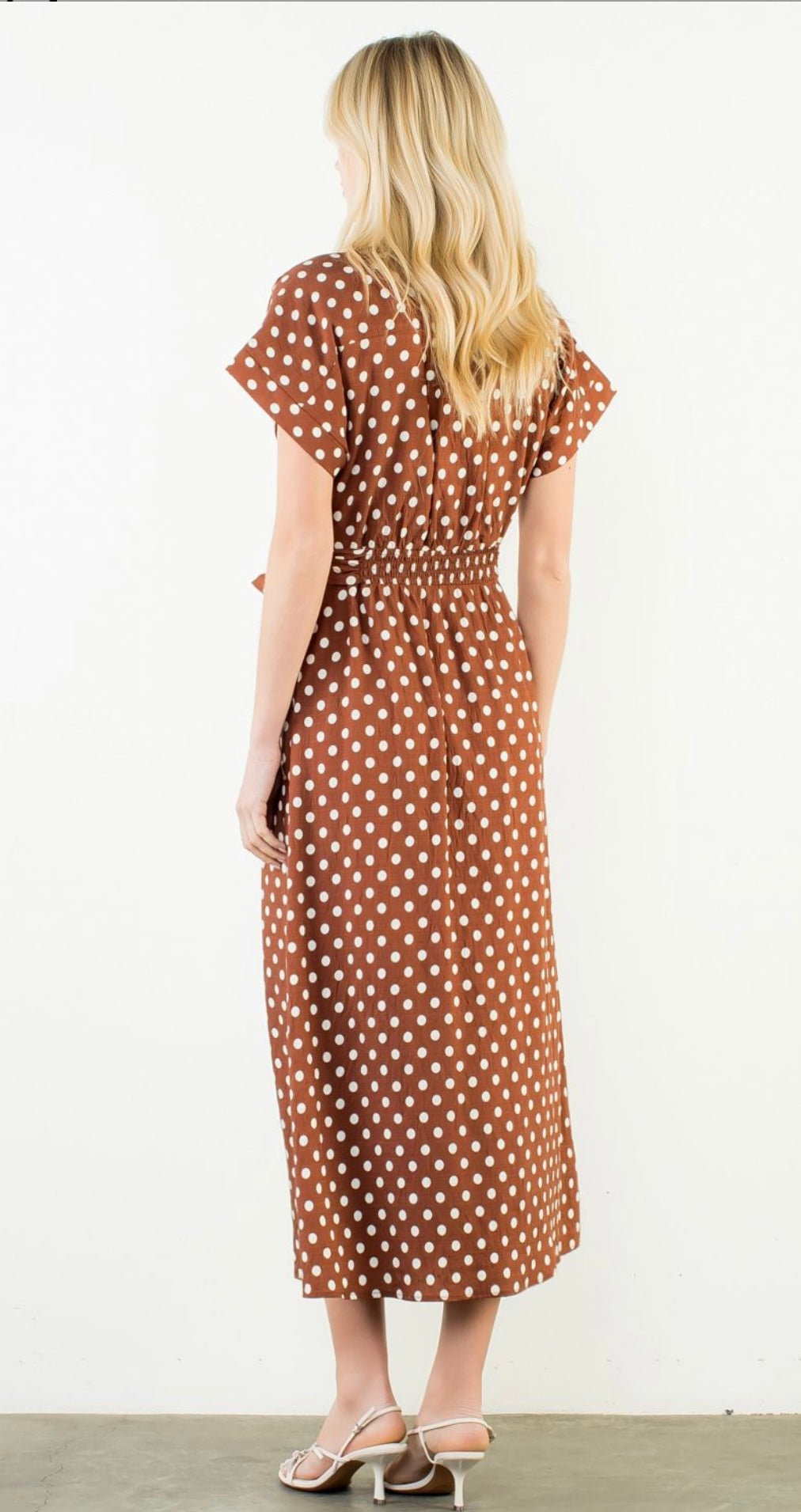Side view of the Short Sleeve Polka Dot Dress showing the white polka dot print – Lady & Tucker