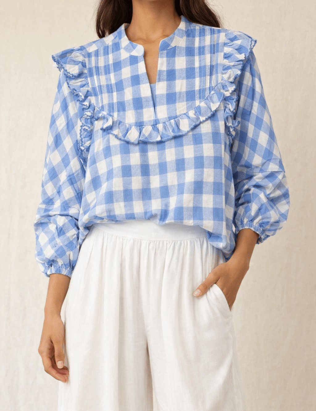 Bluebonnet Top, a Cleobella blue gingham feminine top, worn front view – Lady & Tucker