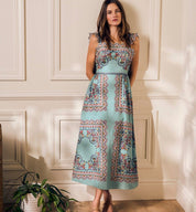 Close-up of the square neck and smocked back on the Veronique Maxi Dress – Lady & Tucker
