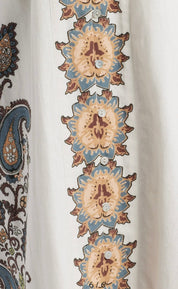 Side view of the Jolene Ankle Dress showing the smocked bodice and back slit – Lady & Tucker