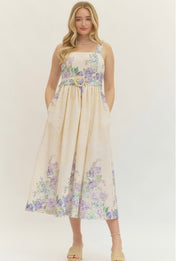 Lavender Spring Dress, a cream midi with lavender floral print, worn front view