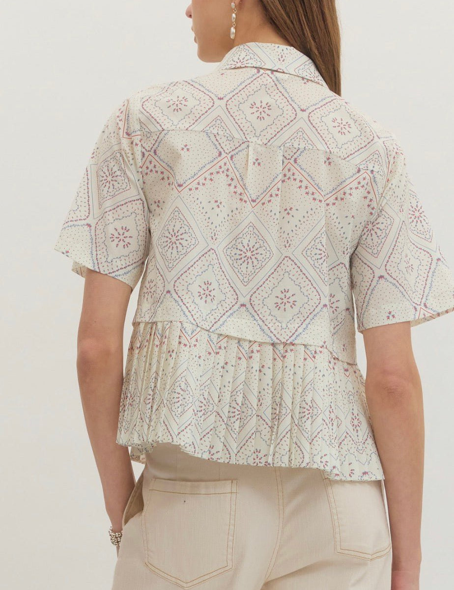 Back view of the Heirloom Top, a cream geometric medallion print blouse