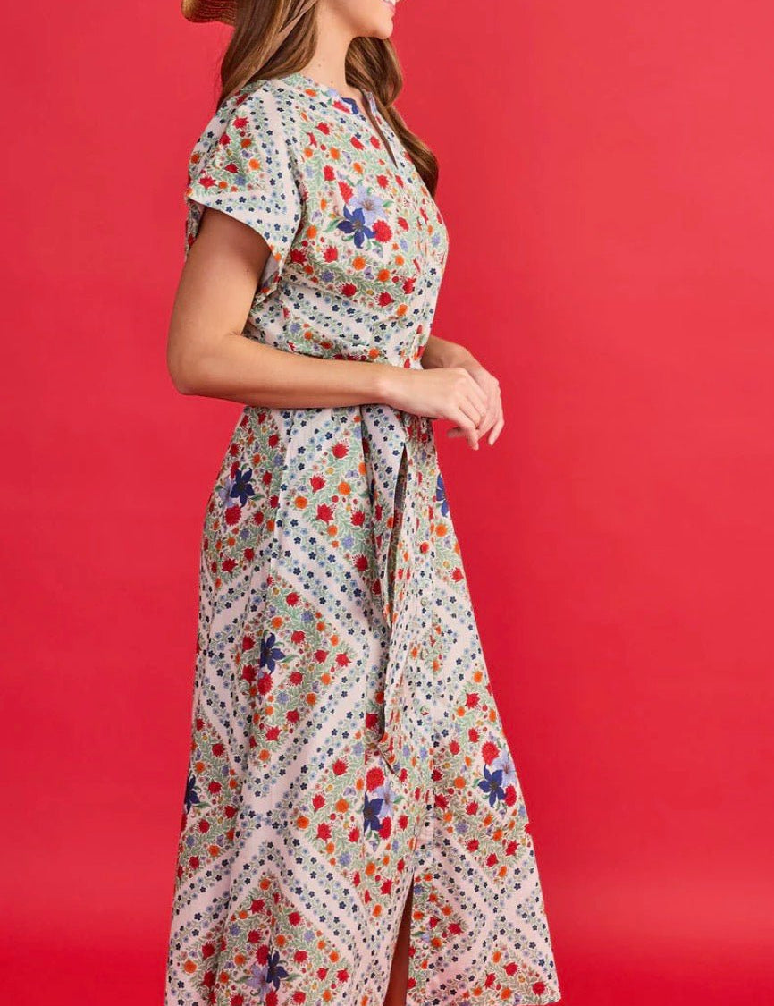 Back view of the Evelyn Dress, a cotton poplin ditsy floral garden party dress
