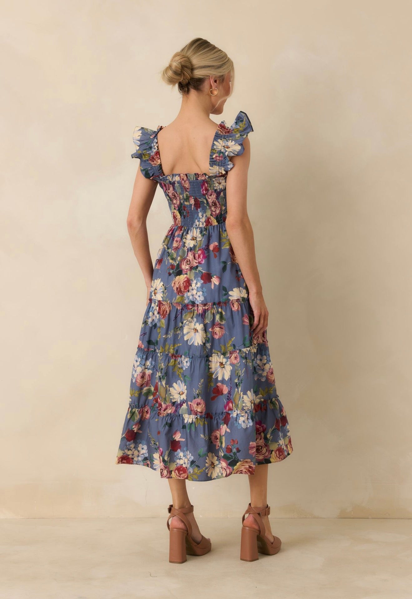 Close-up of the garden floral print and smocked bodice on the Felicity Midi Dress – Lady & Tucker