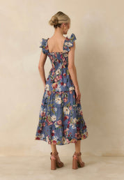 Close-up of the garden floral print and smocked bodice on the Felicity Midi Dress – Lady & Tucker