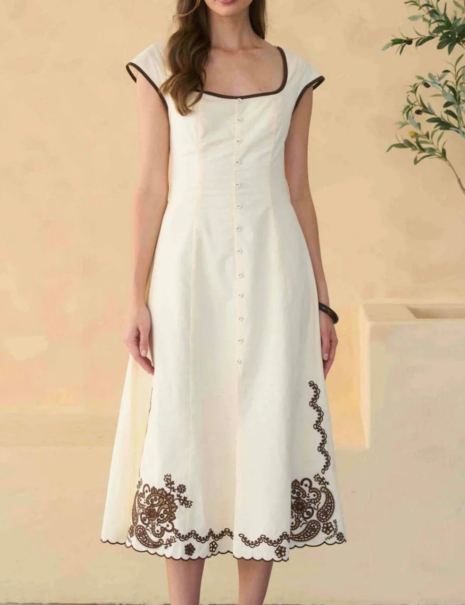 Varenna Dress, an embroidered square-neck sleeveless midi, worn front view
