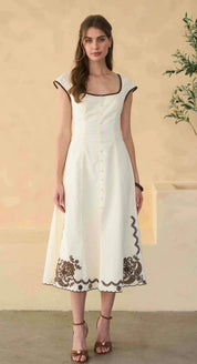 Varenna Dress, an embroidered square-neck sleeveless midi, worn front view