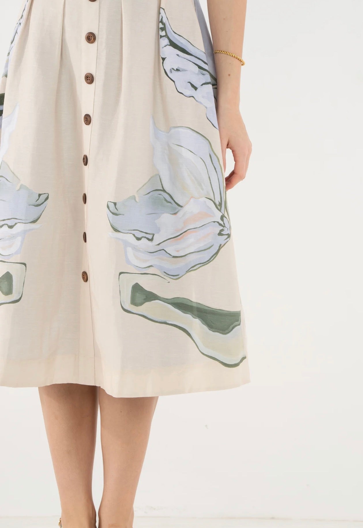 Close-up of the lightly boned bodice and wooden buttons on the Constance Midi Dress