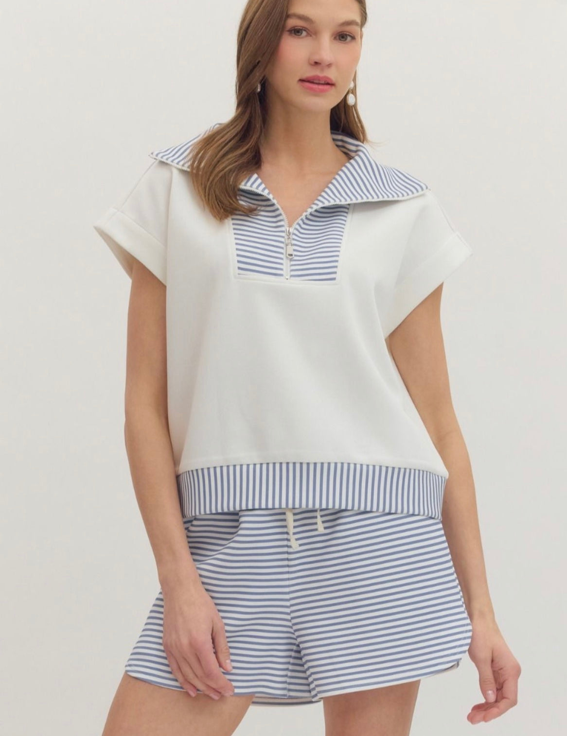 French Blue Belle Set, a French blue striped zip knit set, worn front view