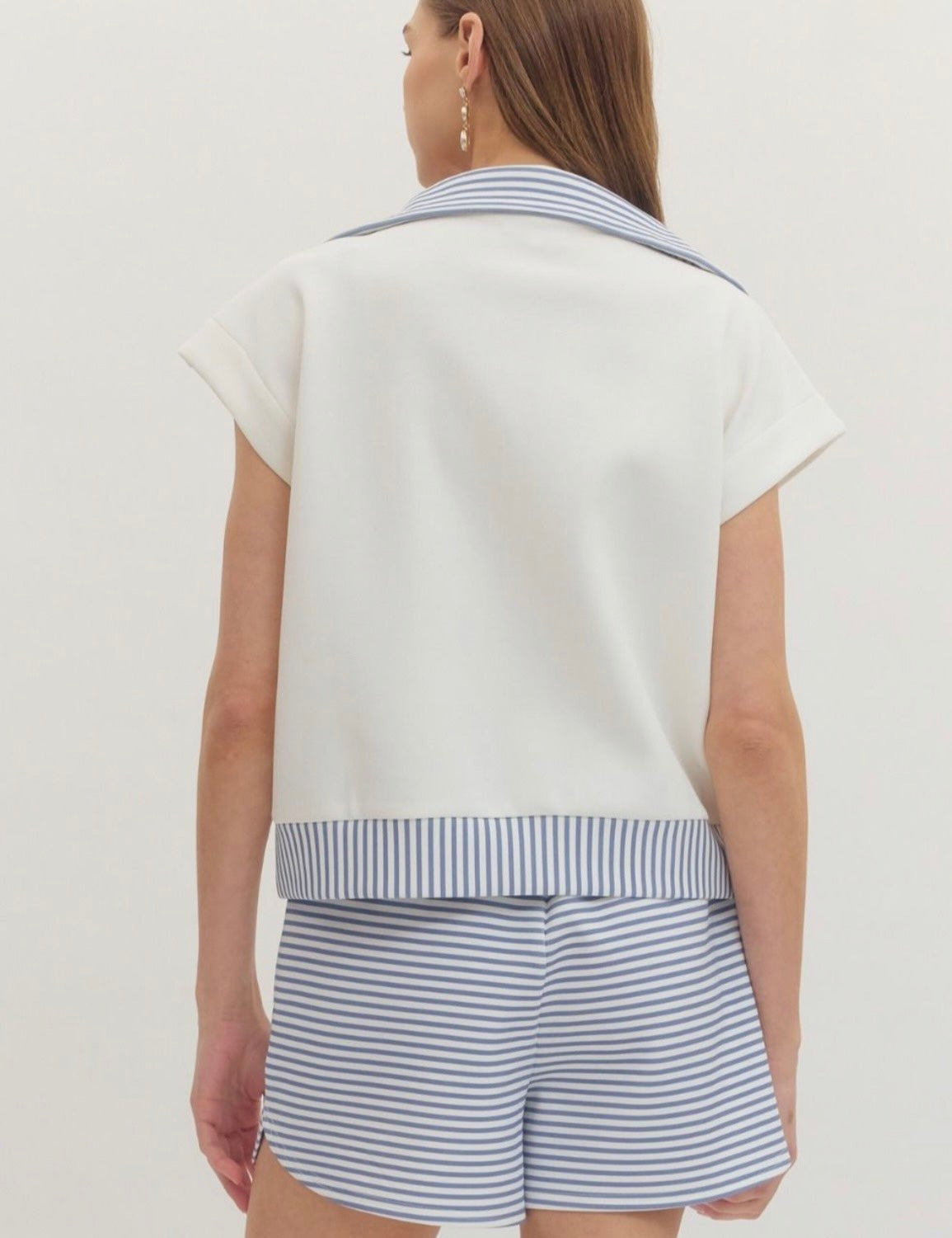 Back view of the French Blue Belle Set, a French blue striped zip knit set