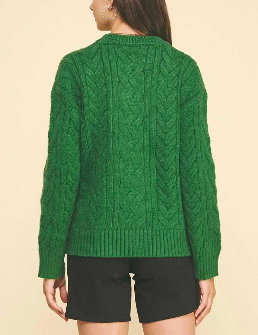 Back view of the Cable Knit Green Sweater, a green cable knit crewneck