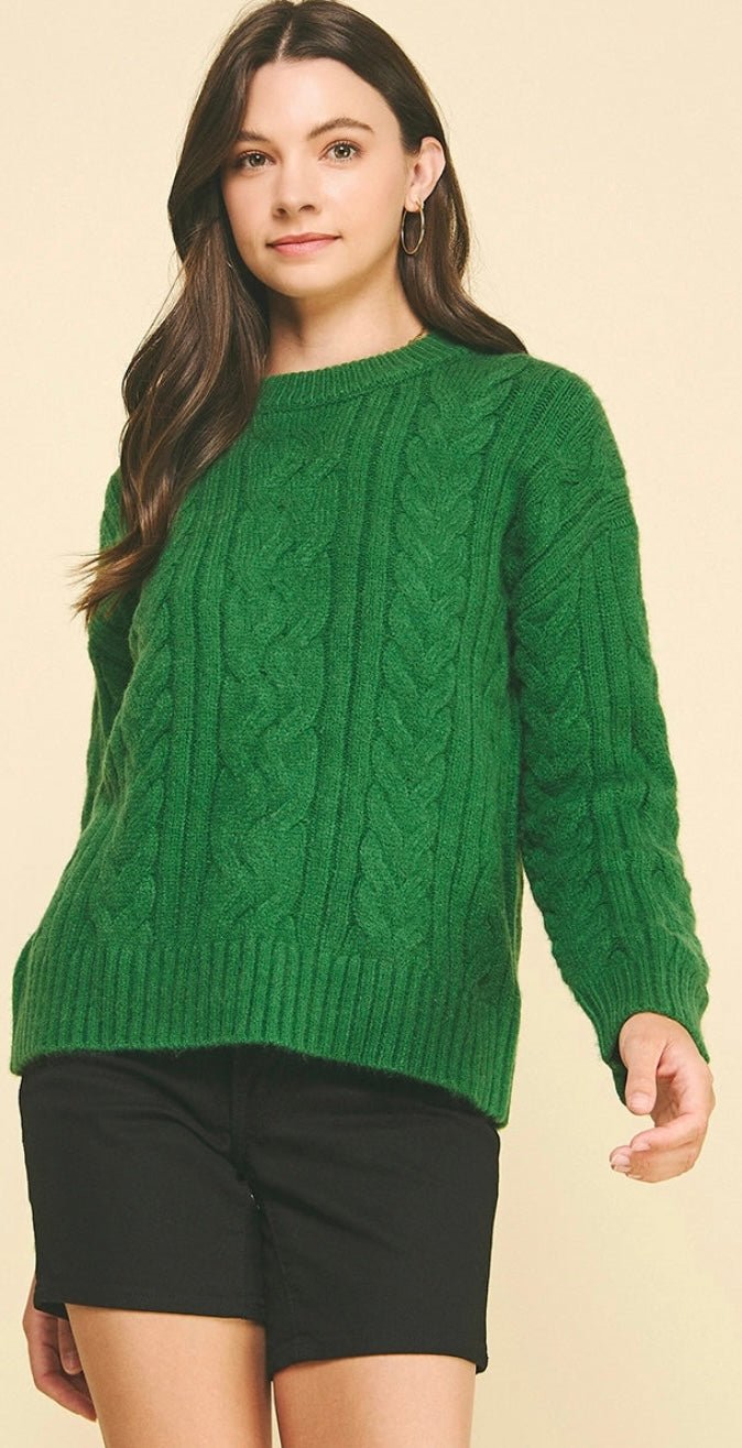 Close-up of the cable knit texture on the Cable Knit Green Sweater – Lady & Tucker