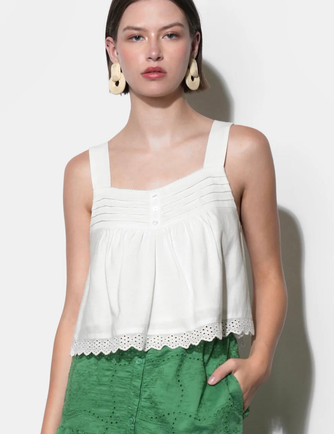 Back view of the Elani Eyelet Tank Top, a pintuck tank with scalloped eyelet hem