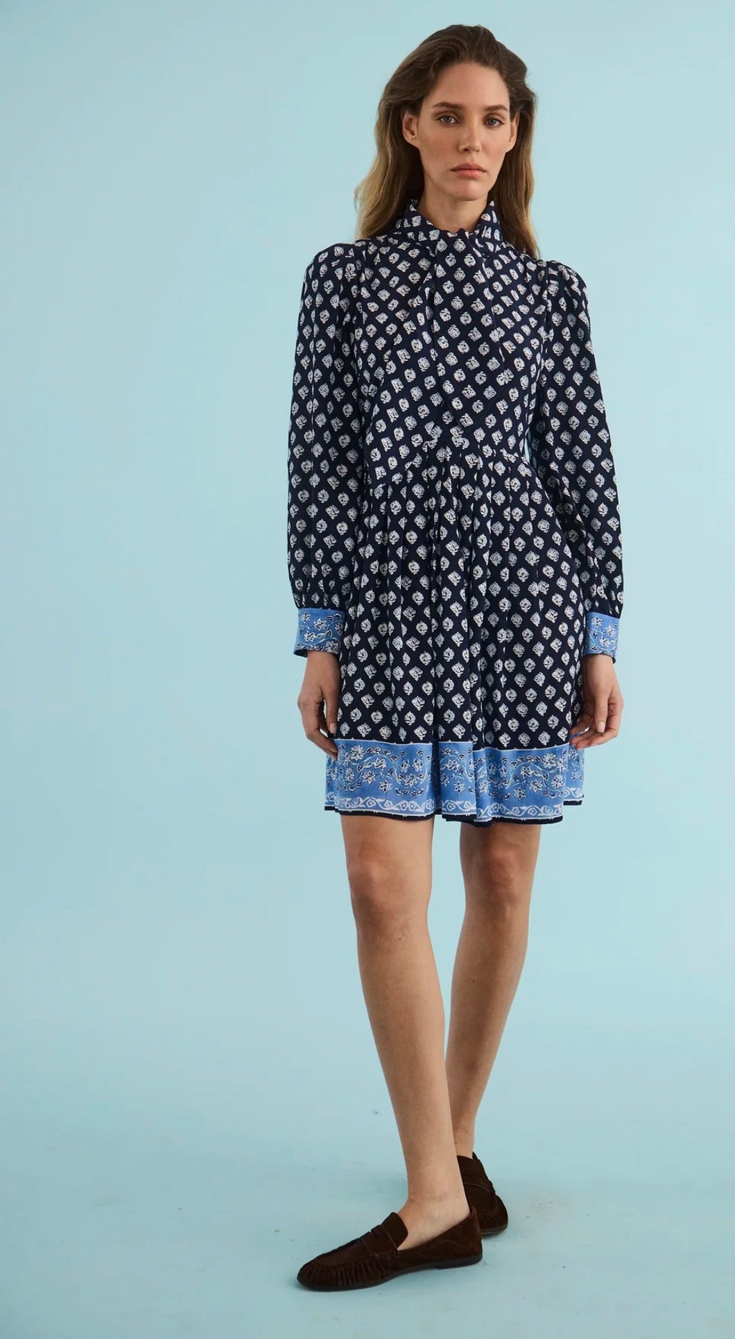 Back view of the Lila Dress, a Hunter Bell Thistle & Vine Blue mini shirt dress