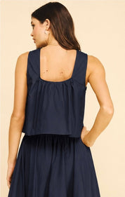 Close-up of the tucked back detail on the Ink Poplin Top – Lady & Tucker