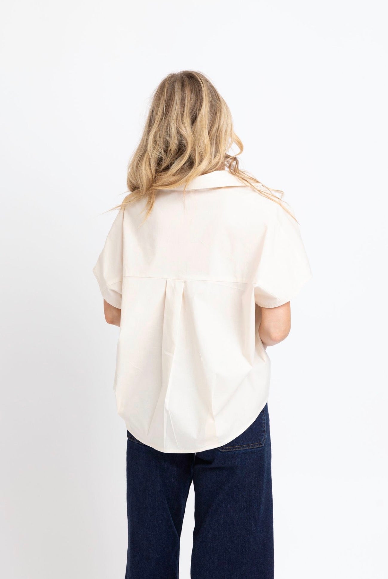 Back view of the Ivory Poplin Top, an ivory crisp poplin blouse