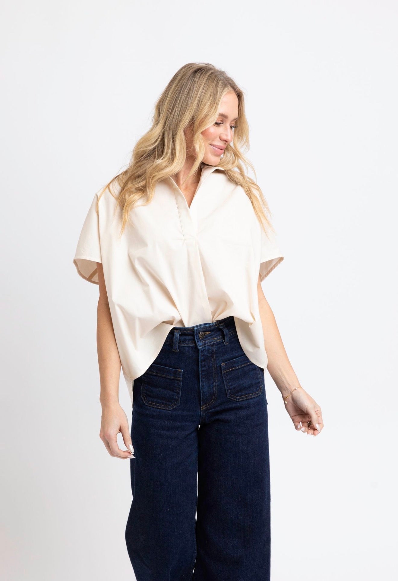 Close-up of the polished collar and crisp poplin on the Ivory Poplin Top – Lady & Tucker