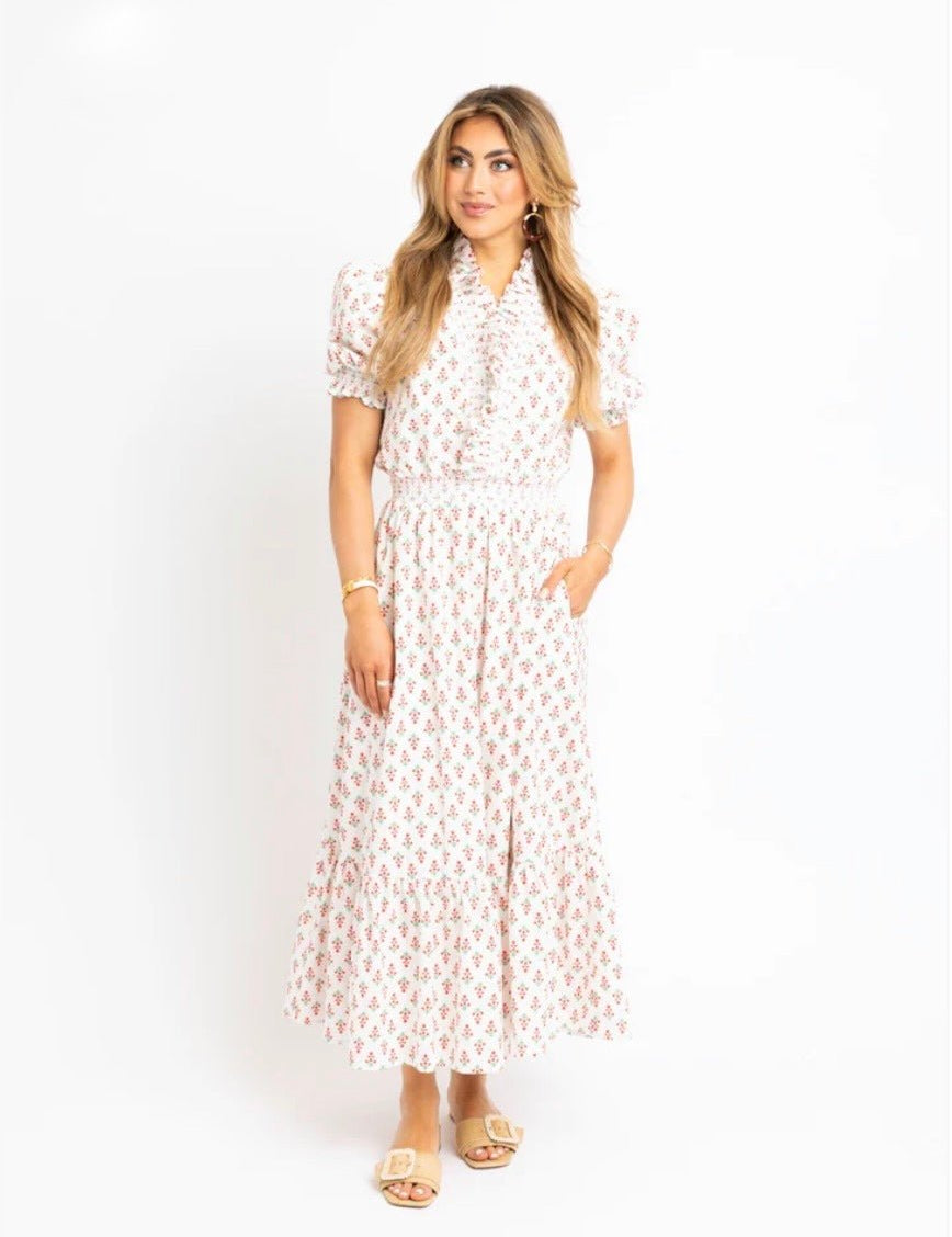 Floral Ruffle Smocked Maxi Dress, an ivory floral smocked ruffle maxi, worn front view