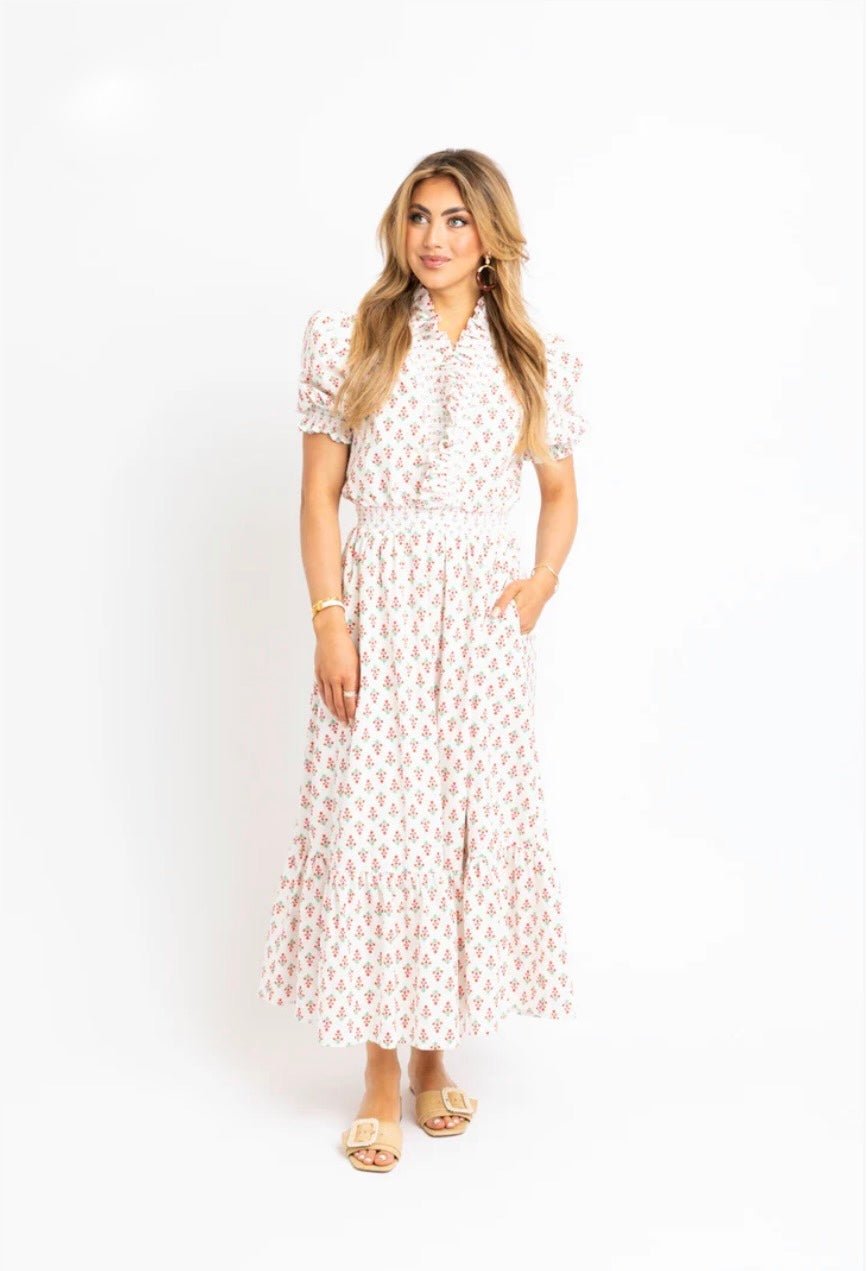 Floral Ruffle Smocked Maxi Dress, an ivory floral smocked ruffle maxi, worn front view