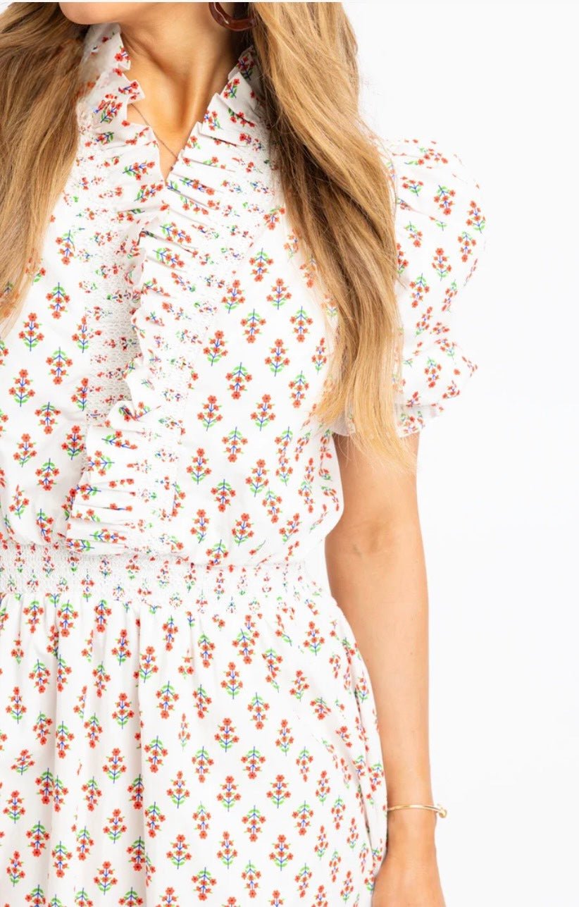 Close-up of the ruffle details and smocked bodice on the Floral Ruffle Smocked Maxi Dress