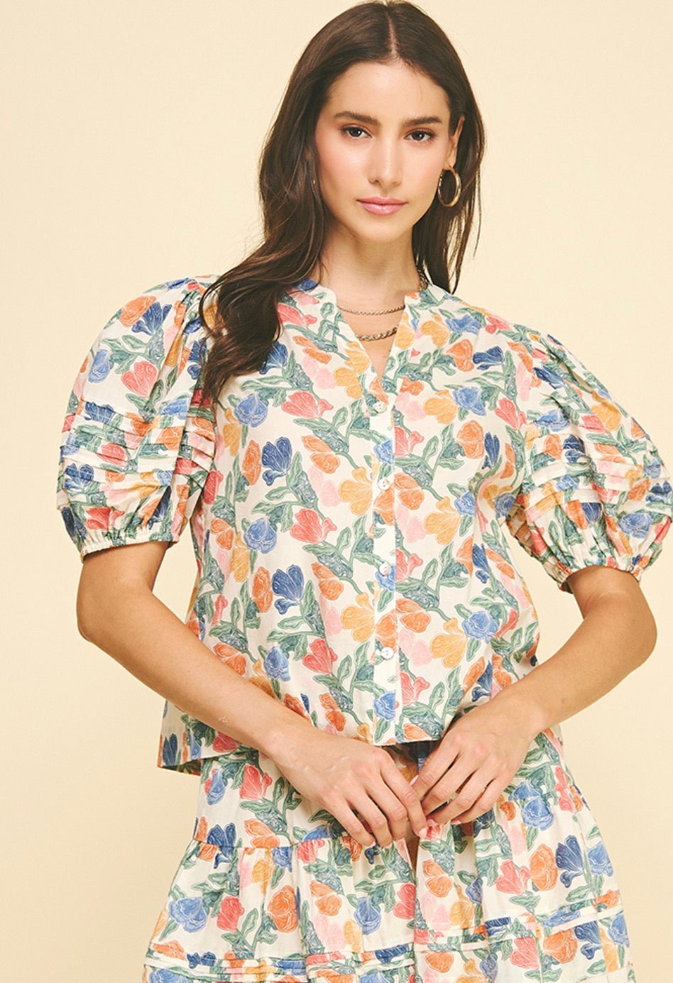 Floral V-neck Top, an ivory floral print V-neck blouse, worn front view