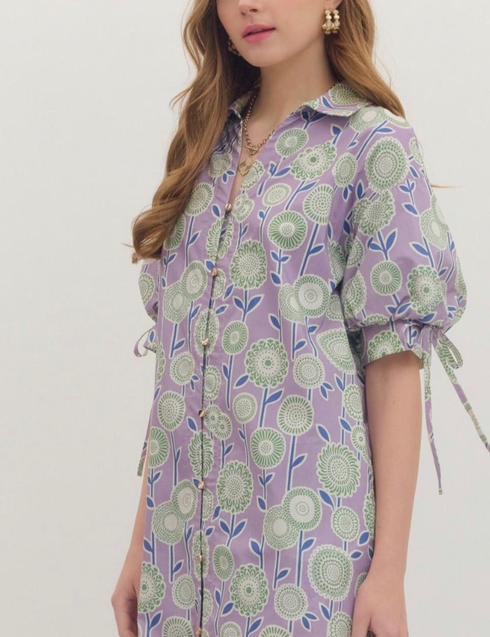 Back view of the Lavender Fields Dress, a botanical print tie-sleeve mini