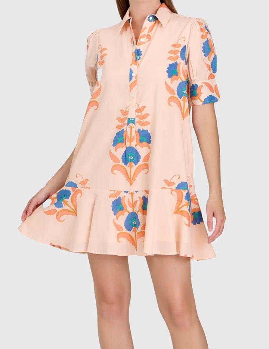 Pink Sands Liv Dress, a pink drop-waist puff sleeve mini, worn front view