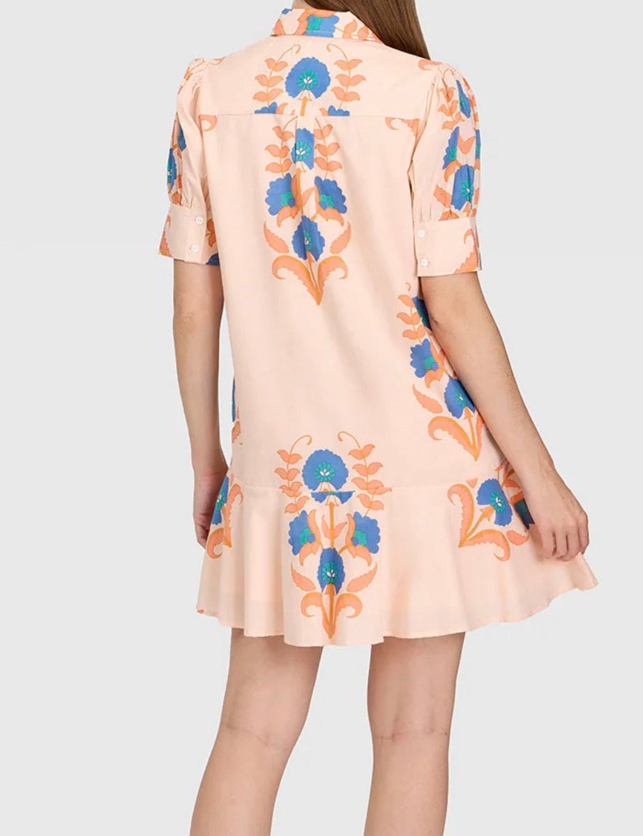 Back view of the Pink Sands Liv Dress, a pink drop-waist puff sleeve mini