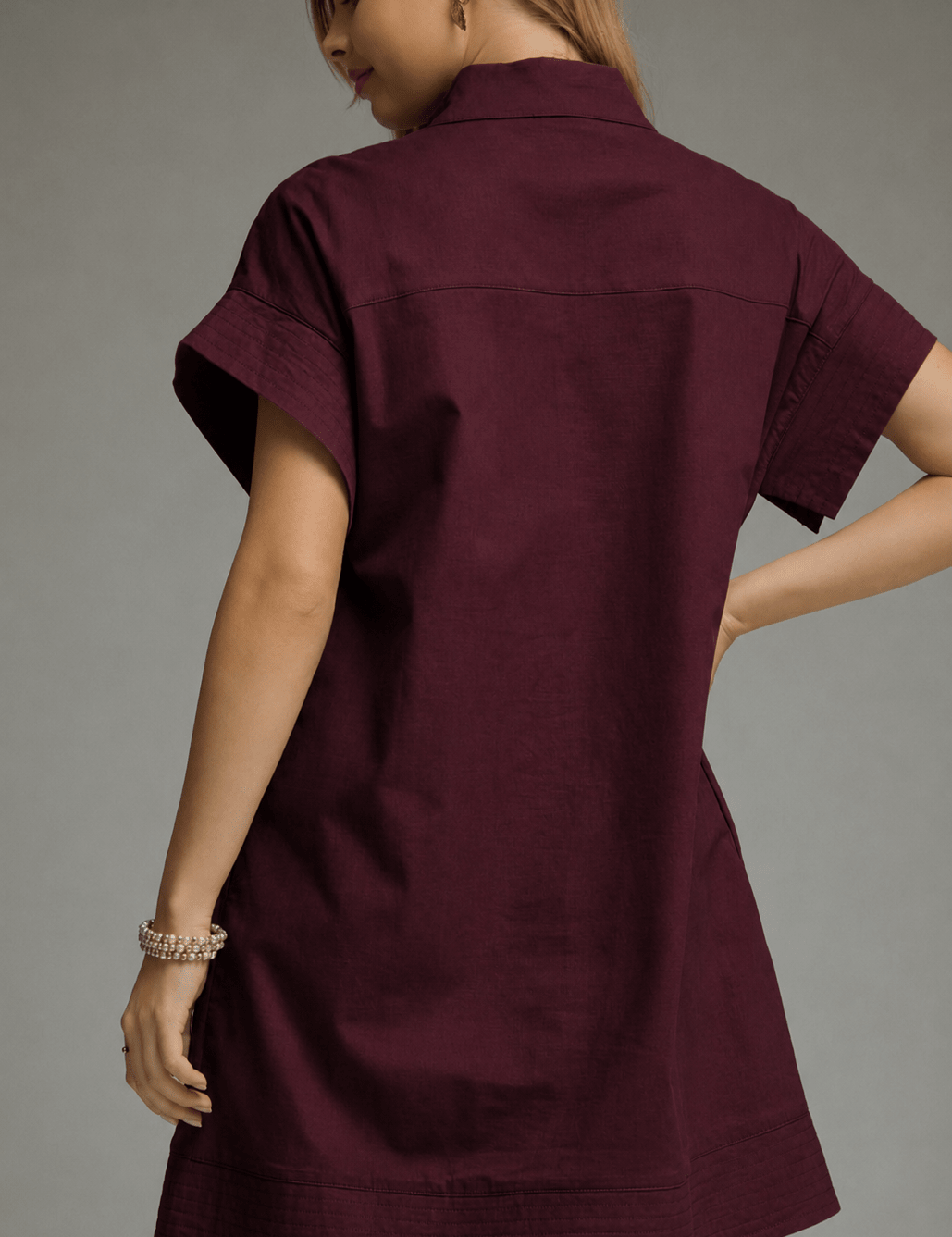Back view of the Maroon Fan Dress, a maroon shift with stand collar – Lady & Tucker