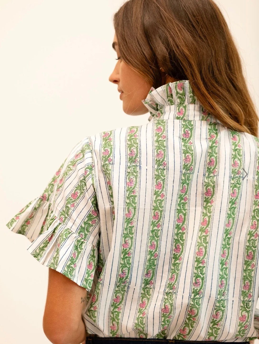 Back view of the Sweet Pea Stripe Top, a Mille sweet pea stripe ruffle top