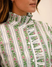 Close-up of the cascading ruffles and bell sleeves on the Sweet Pea Stripe Top