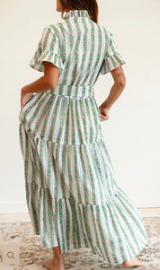 Close-up of the tiered skirt and stripe on the Sweet Pea Stripe Maxi Dress – Lady & Tucker
