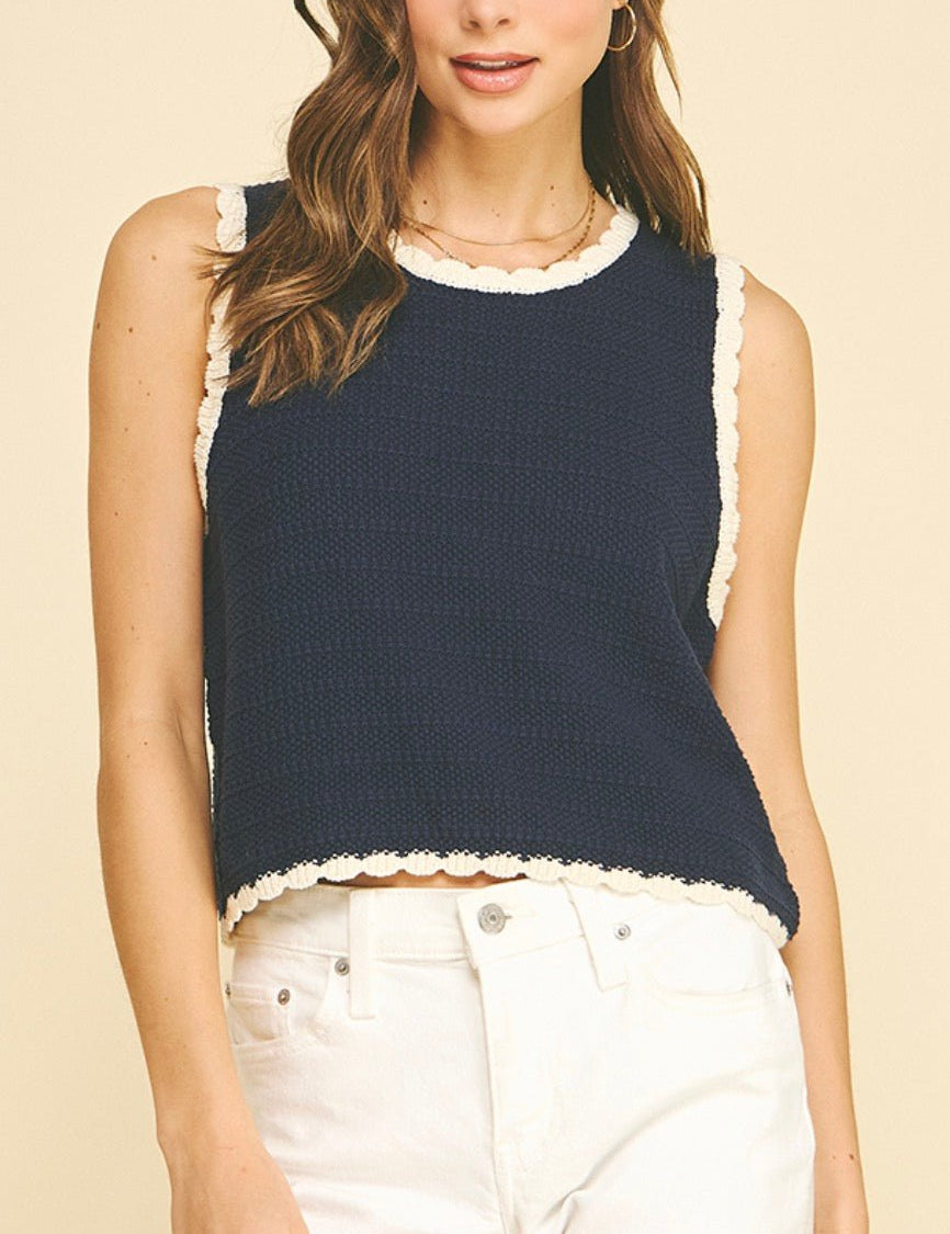 Navy and Cream Crochet Top, a sleeveless navy knit top with white trim, worn front view